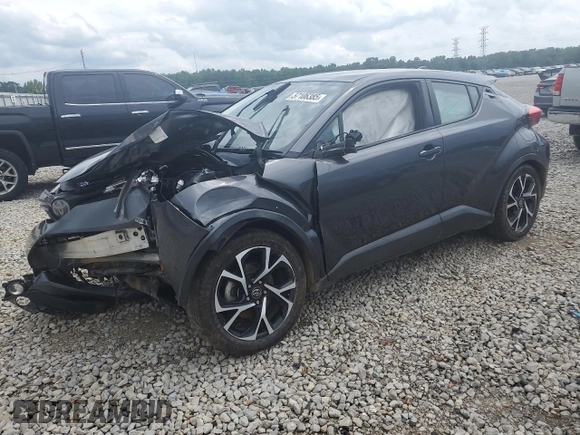 2018 Toyota C-HR XLE z VIN NMTKHMBX7JR004515, wystawiony jako Copart lot #57106385 z przebiegiem Nie podano mil oraz Szkoda całkowita • Salvage title. Historia ofert i sprzedaży dostępna na DreamBid. Obrazek 1.