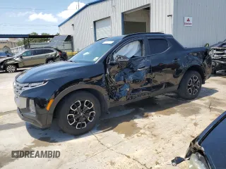 2022 Hyundai Santa Cruz SEL Premium z VIN 5NTJDDAF3NH027823, wystawiony jako Copart lot #56867995 z przebiegiem 21 697 mil mil oraz Szkoda całkowita • Salvage title. Historia ofert i sprzedaży dostępna na DreamBid. Obrazek 1.