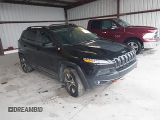 2014 Jeep Cherokee Trailhawk with VIN 1C4PJMBS3EW150366, listed as a IAAI auction lot 41971035 with 90,994 mi miles. Bid and sale history available at carsss.com. Image 1.