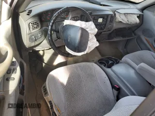 1997 Ford F-150 z VIN 1FTDX0766VKA86983, wystawiony jako Copart lot #50896215 z przebiegiem 214 746 mil mil oraz Szkoda całkowita • Salvage title. Historia ofert i sprzedaży dostępna na DreamBid. Obrazek 8.