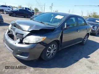 2010 Toyota Corolla with VIN 2T1BU4EE0AC371711, listed as a IAAI auction lot 41784869 with 82,999 mi miles. Bid and sale history available at carsss.com. Image 2.