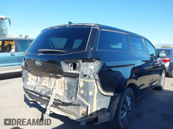 2020 Kia Sedona EX with VIN KNDMB5C11L6594029, listed as a IAAI auction lot 40951800 with 164,989 mi miles. Bid and sale history available at carsss.com. Image 4.