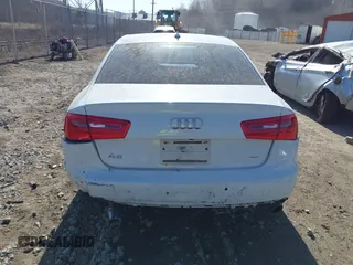 2015 Audi A6 Premium Plus z VIN WAUGFAFC4FN016103, wystawiony jako IAAI lot #41774479 z przebiegiem 125 412 mil mil oraz . Historia ofert i sprzedaży dostępna na DreamBid. Obrazek 17.