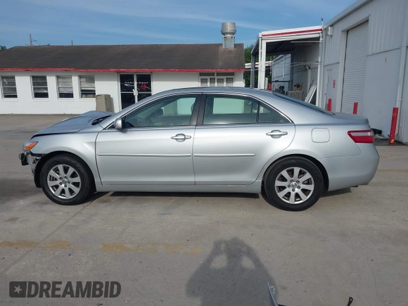 2007 Toyota Camry LE with VIN 4T1BK46K57U035795, listed as a IAAI auction lot 42076552 with 16,826 mi miles and . Bid and sale history available at DreamBid. Image 15.