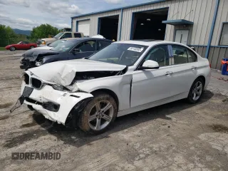2015 BMW 3 Series 328i xDrive with VIN WBA3B3G52FNR88594, listed as a Copart auction lot 56148555 with 106,018 mi miles and Salvage title. Bid and sale history available at DreamBid. Image 1.