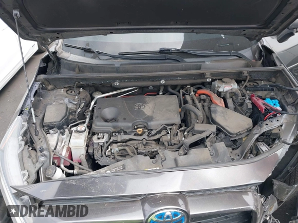 2020 Toyota RAV4 Hybrid XLE with VIN 2T3RWRFV5LW058103, listed as a IAAI auction lot 42665299 with 112,634 mi miles and . Bid and sale history available at DreamBid. Image 10.