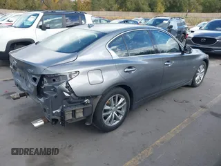 2017 Infiniti Q50 Premium with VIN JN1EV7AR2HM830032, listed as a IAAI auction lot 40777161 with 104,834 mi miles and . Bid and sale history available at DreamBid. Image 4.