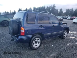 2001 Suzuki Vitara JX z VIN 2S3TD52V916109753, wystawiony jako Copart lot #41543965 z przebiegiem 102 720 mil mil oraz Szkody całkowita. Historia ofert i sprzedaży dostępna na DreamBid. Obrazek 3.