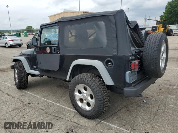 2005 Jeep Wrangler Unlimited with VIN 1J4FA44S75P358246, listed as a Copart auction lot 60958695 with 150,003 mi miles and Salvage title. Bid and sale history available at DreamBid. Image 2.