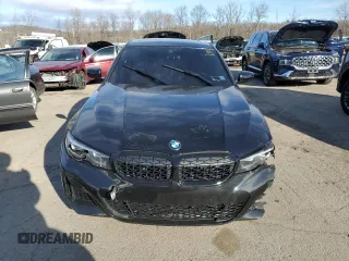 2022 BMW 3 Series M340i xDrive with VIN 3MW5U9J02N8C24006, listed as a Copart auction lot 87841145 with 0 mi miles and Salvage Title. Bid and sale history available at carsss.com. Image 5.