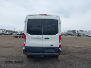 2015 Ford Transit Cargo z VIN 1FTNR2CM4FKA84584, wystawiony jako IAAI lot #42008193 z przebiegiem 224 453 mil mil oraz . Historia ofert i sprzedaży dostępna na DreamBid. Obrazek 16.