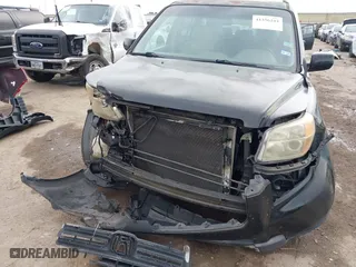 2007 Honda Pilot EX-L with VIN 5FNYF28557B027087, listed as a IAAI auction lot 41356244 with 183,923 mi miles. Bid and sale history available at carsss.com. Image 6.