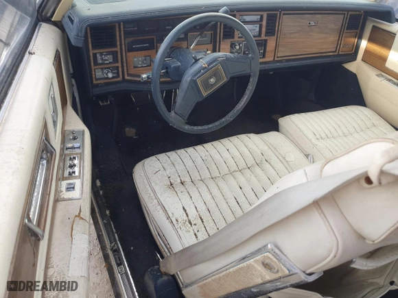 1985 Cadillac Eldorado with VIN 1G6EL5782FE630140, listed as a Copart auction lot 76367454 with 29,850 mi miles and Salvage Title. Bid and sale history available at carsss.com. Image 8.