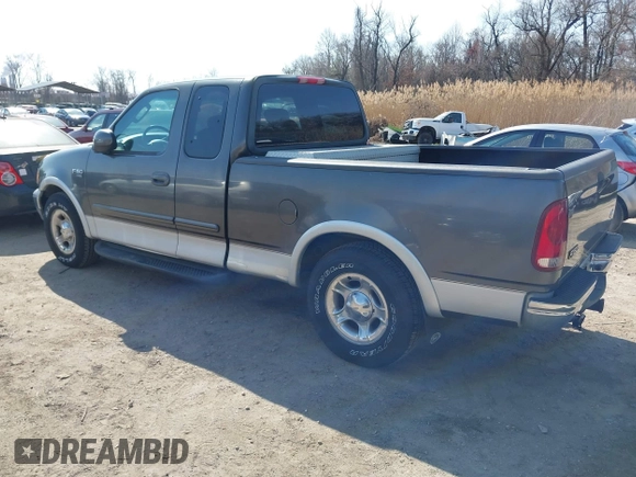 2003 Ford F-150 XL with VIN 1FTRX17L33NB61748, listed as a IAAI auction lot 41789730 with 301,092 mi miles. Bid and sale history available at carsss.com. Image 3.