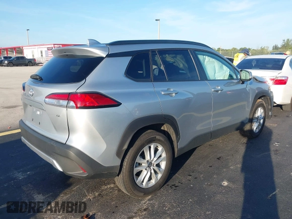 2023 Toyota Corolla Cross LE with VIN 7MUCAAAG0PV037445, listed as a IAAI auction lot 42686510 with 18,282 mi miles and . Bid and sale history available at DreamBid. Image 4.