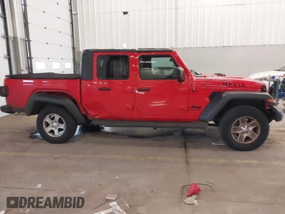 2020 Jeep Gladiator Sport S z VIN 1C6HJTAGXLL125496, wystawiony jako IAAI lot #41749633 z przebiegiem 56 203 mil mil oraz . Historia ofert i sprzedaży dostępna na DreamBid. Obrazek 13.