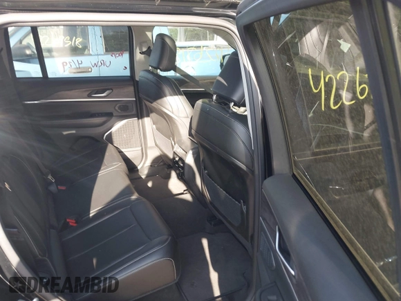 2023 Jeep Grand Cherokee with VIN 1C4RJYB68PC648859, listed as a IAAI auction lot 42267180 with 29,809 mi miles and . Bid and sale history available at DreamBid. Image 8.