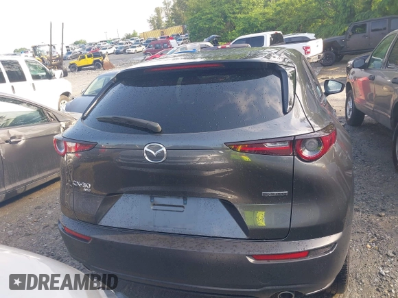 2024 Mazda CX-30 S Select Sport z VIN 3MVDMBBM1RM634542, wystawiony jako IAAI lot #42204673 z przebiegiem 24 694 mil mil oraz . Historia ofert i sprzedaży dostępna na DreamBid. Obrazek 16.