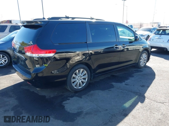 2012 Toyota Sienna XLE AAS with VIN 5TDYK3DC5CS268322, listed as a IAAI auction lot 41515422 with 218,201 mi miles and . Bid and sale history available at DreamBid. Image 4.