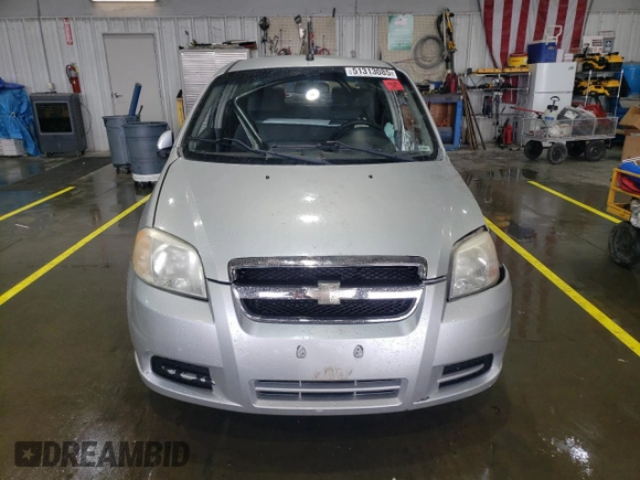 2011 Chevrolet Aveo 1LT z VIN KL1TD5DE6BB154327, wystawiony jako Copart lot #51313085 z przebiegiem 76 402 mil mil oraz Szkoda całkowita • Salvage title. Historia ofert i sprzedaży dostępna na DreamBid. Obrazek 5.