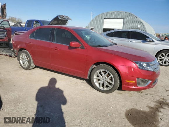2012 Ford Fusion SEL z VIN 3FAHP0JG8CR435577, wystawiony jako Copart lot #79741724 z przebiegiem 145 023 mil mil oraz Szkoda całkowita • Salvage title. Historia ofert i sprzedaży dostępna na DreamBid. Obrazek 4.