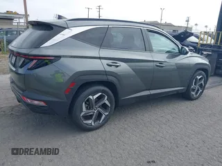 2022 Hyundai Tucson SEL z VIN 5NMJF3AE6NH133724, wystawiony jako IAAI lot #42309502 z przebiegiem 49 156 mil mil oraz . Historia ofert i sprzedaży dostępna na DreamBid. Obrazek 4.