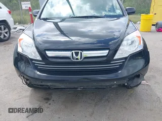 2007 Honda CR-V EX-L with VIN JHLRE38717C038957, listed as a IAAI auction lot 41935050 with 209,807 mi miles and . Bid and sale history available at carsss.com. Image 6.