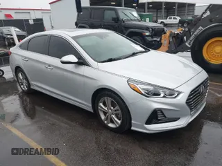 2018 Hyundai Sonata SEL with VIN 5NPE34AF0JH696872, listed as a IAAI auction lot 41070305 with 121,000 mi miles and . Bid and sale history available at DreamBid. Image 1.