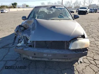 2003 Kia Spectra z VIN KNAFB121335277388, wystawiony jako Copart lot #46756185 z przebiegiem 151 235 mil mil oraz Szkoda całkowita • Salvage title. Historia ofert i sprzedaży dostępna na DreamBid. Obrazek 5.