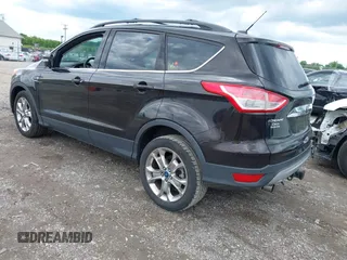2013 Ford Escape SEL z VIN 1FMCU9H98DUB78564, wystawiony jako IAAI lot #42381290 z przebiegiem 89 728 mil mil oraz . Historia ofert i sprzedaży dostępna na DreamBid. Obrazek 3.