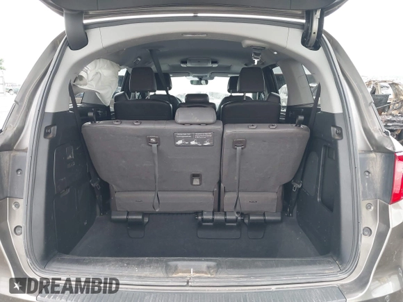 2019 Honda Odyssey Touring with VIN 5FNRL6H81KB038790, listed as a IAAI auction lot 42200190 with 131,761 mi miles and . Bid and sale history available at DreamBid. Image 12.