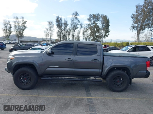 2017 Toyota Tacoma SR5 with VIN 3TMAZ5CN7HM036078, listed as a IAAI auction lot 41698163 with 91,376 mi miles. Bid and sale history available at carsss.com. Image 14.