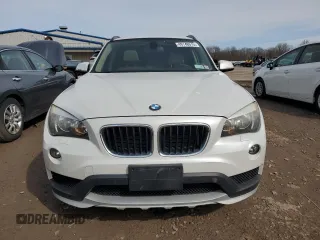 2015 BMW X1 xDrive28i with VIN WBAVL1C58FVY28445, listed as a Copart auction lot 49148015 with 144,319 mi miles and Clean Title. Bid and sale history available at carsss.com. Image 5.
