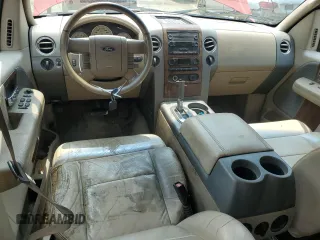 2004 Ford F-150 XLT with VIN 1FTPW14504KD65703, listed as a Copart auction lot 58792215 with 303,083 mi miles and Salvage title. Bid and sale history available at DreamBid. Image 8.
