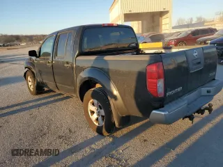 2010 Nissan Frontier SE with VIN 1N6AD0EV6AC404172, listed as a Copart auction lot 83233344 with 301,326 mi miles and Salvage title. Bid and sale history available at DreamBid. Image 2.