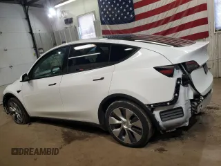 2023 Tesla Model Y Long Range z VIN 7SAYGDEE5PF619265, wystawiony jako Copart lot #48418655 z przebiegiem 42 233 mil mil oraz Szkoda całkowita • Salvage title. Historia ofert i sprzedaży dostępna na DreamBid. Obrazek 2.