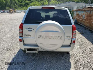 2011 Suzuki Grand Vitara Premium z VIN JS3TD0D29B4103041, wystawiony jako Copart lot #62066985 z przebiegiem 219 727 mil mil oraz Szkoda całkowita • Salvage title. Historia ofert i sprzedaży dostępna na DreamBid. Obrazek 6.