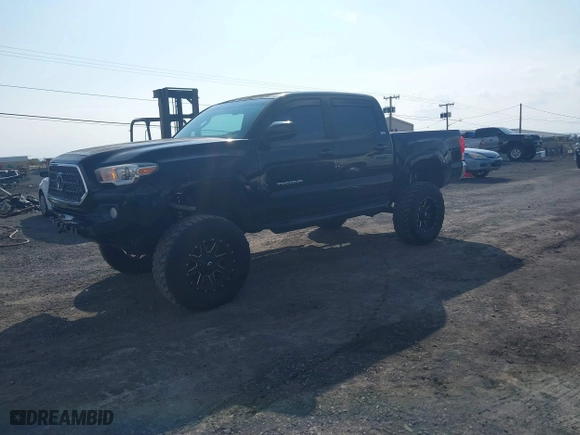 2016 Toyota Tacoma SR with VIN 3TMCZ5AN0GM023313, listed as a IAAI auction lot 41357990 with 103,335 mi miles. Bid and sale history available at carsss.com. Image 17.