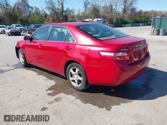 2007 Toyota Camry CE with VIN JTNBE46K073031988, listed as a IAAI auction lot 42062321 with 238,925 mi miles. Bid and sale history available at carsss.com. Image 3.