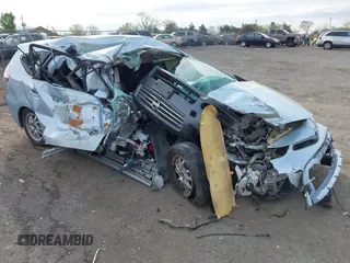 2016 Toyota Prius Two z VIN JTDZN3EU0GJ053887, wystawiony jako IAAI lot #41984065 z przebiegiem Nie podano mil oraz . Historia ofert i sprzedaży dostępna na DreamBid. Obrazek 1.