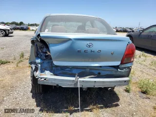 2002 Toyota ECHO with VIN JTDAT123320207199, listed as a Copart auction lot 55177854 with 0 mi miles and Salvage Title. Bid and sale history available at carsss.com. Image 6.