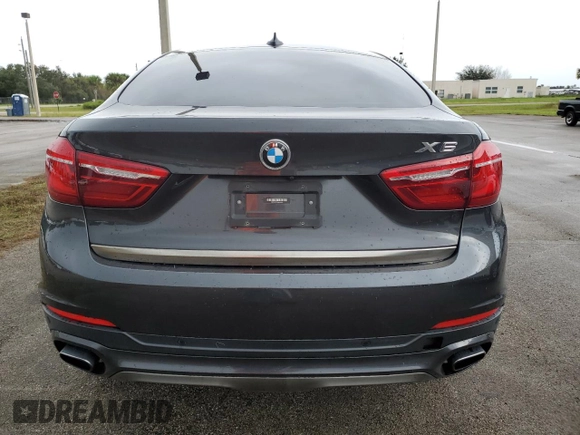 2018 BMW X6 xDrive50i with VIN 5UXKU6C5XJ0W39056, listed as a Copart auction lot 75116634 with 90,043 mi miles and Salvage Title. Bid and sale history available at carsss.com. Image 6.
