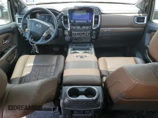2023 Nissan Titan Platinum Reserve with VIN 1N6AA1EDXPN106467, listed as a Copart auction lot 53455215 with 56,061 mi miles and Salvage title. Bid and sale history available at DreamBid. Image 8.
