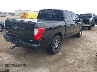 2021 Nissan Titan SV z VIN 1N6AA1EF9MN523477, wystawiony jako IAAI lot #41536972 z przebiegiem 47 917 mil mil oraz . Historia ofert i sprzedaży dostępna na DreamBid. Obrazek 4.