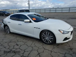 2015 Maserati Ghibli S Q4 with VIN ZAM57RTAXF1150142, listed as a Copart auction lot 39860754 with 56,483 mi miles. Bid and sale history available at carsss.com. Image 4.