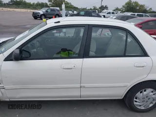 2000 Mazda Protege DX with VIN JM1BJ2220Y0273953, listed as a IAAI auction lot 41956058 with 158,837 mi miles and . Bid and sale history available at DreamBid. Image 14.