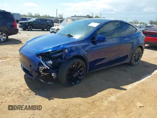 2020 Tesla Model Y Long Range with VIN 5YJYGDEF4LF000494, listed as a IAAI auction lot 41894856 with 118,638 mi miles and . Bid and sale history available at DreamBid. Image 16.