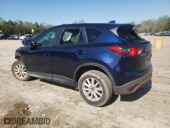 2013 Mazda CX-5 Touring with VIN JM3KE2CE0D0142102, listed as a Copart auction lot 51223575 with Not Provided miles and Salvage Title. Bid and sale history available at DreamBid. Image 2.