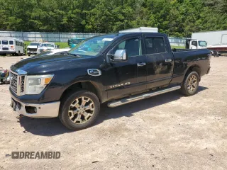 2016 Nissan Titan Platinum Reserve z VIN 1N6BA1F48GN513710, wystawiony jako Copart lot #61187715 z przebiegiem 291 548 mil mil oraz Czysty tytuł • Clean title. Historia ofert i sprzedaży dostępna na DreamBid. Obrazek 1.