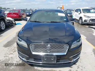 2017 Lincoln MKZ Premiere z VIN 3LN6L5A92HR628287, wystawiony jako IAAI lot #42474344 z przebiegiem 70 010 mil mil oraz . Historia ofert i sprzedaży dostępna na DreamBid. Obrazek 12.